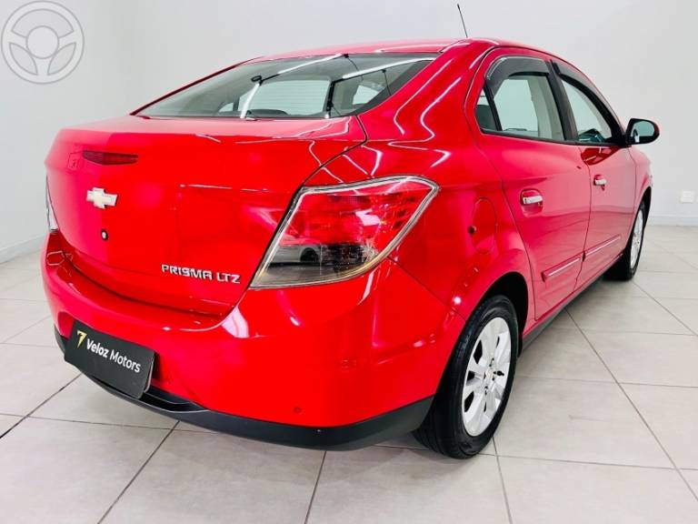 CHEVROLET - PRISMA 1.4 MPFI LTZ 8V FLEX 4P MANUAL - 2013/2014 - VERMELHA - R$ 49.900,00