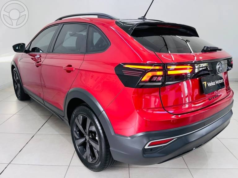 VOLKSWAGEN - NIVUS 1.0 200 TSI HIGHLINE LAUNCHING EDITION TOTAL FLEX 4P AUTOMÁTICO - 2023/2024 - VERMELHA - R$ 123.000,00