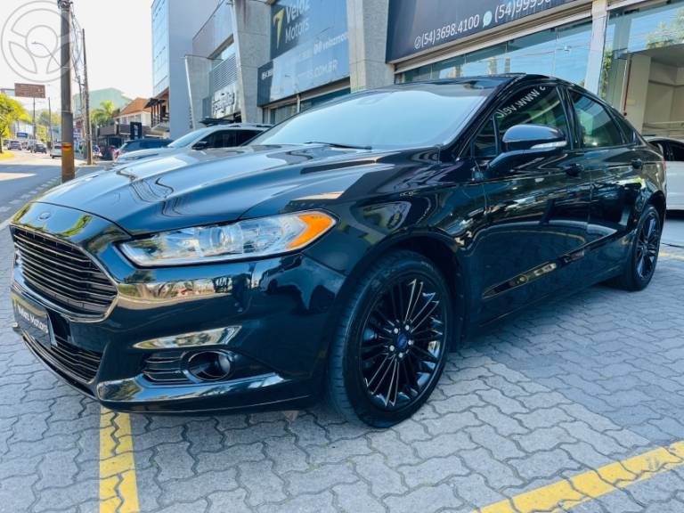 FORD - FUSION 2.0 TITANIUM FWD 16V 4P AUTOMÁTICO - 2014/2015 - PRETA - R$ 79.990,00